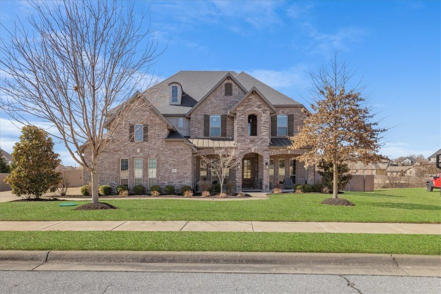 Welcome to 303 Torrance Drive in the desirable Otter Creek community of Cave Springs, offering 4,059 sq ft of well-designed living space and a true backyard retreat. This 5-bedroom, 3.5-bath home includes a dedicated office, formal dining connected to a butler’s pantry with coffee bar, two bonus rooms upstairs, and four walk-in closets for exceptional storage. An expanded finished shelter under the stairs adds flexible space.

Step outside to enjoy the heated gunite pool and spa with tanning ledge, surrounded by a cool deck and mature trees for added privacy. The extended covered patio overlooks the pool, creating the perfect setting for outdoor dining and entertaining. A sprinkler system services both the front and back yards for easy maintenance.

Conveniently located near I-49 with quick access to Rogers shopping and dining. Community amenities included.