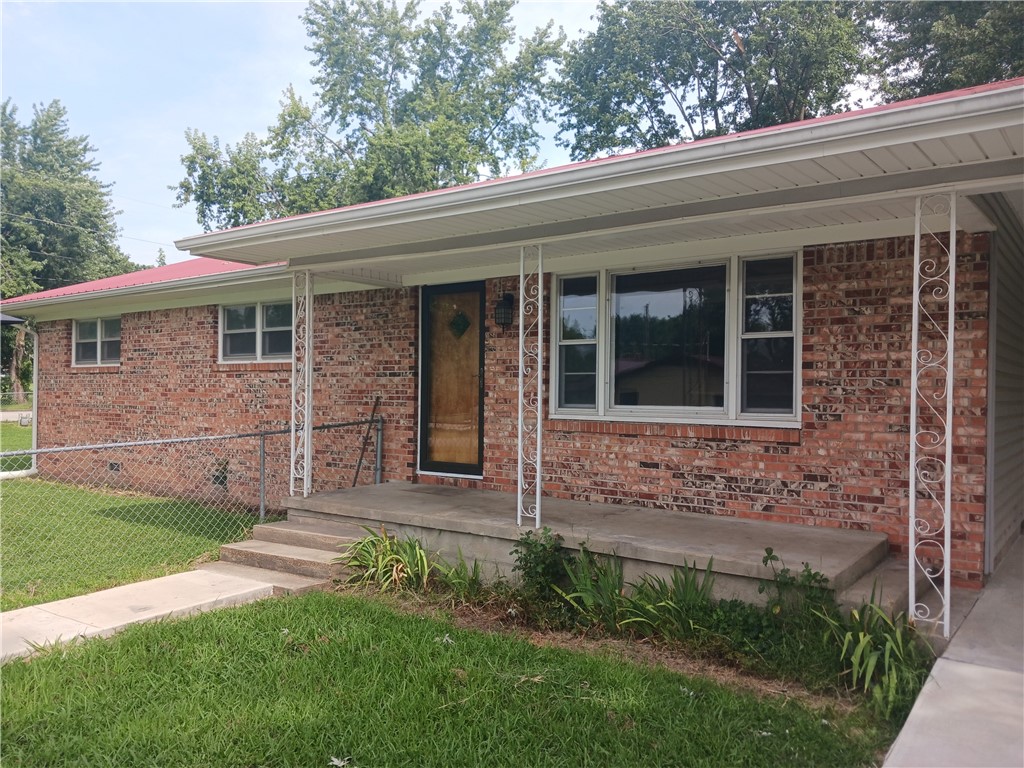 Maintence free home in the heart of green forest seeks new family to love! You're going to love the open space, possibilities and flow in this brick home with metal roof. The 3 bedrooms, 2 baths and 2 living rooms boast plenty of natural light. With a half acre corner lot, this fenced in yard is perfect for pets or little ones, and still plenty more room to add additional buildings or storage sheds. The Outdoor Concrete Patio space will be where the gatherings become most memorable for years to come. Welcome Home