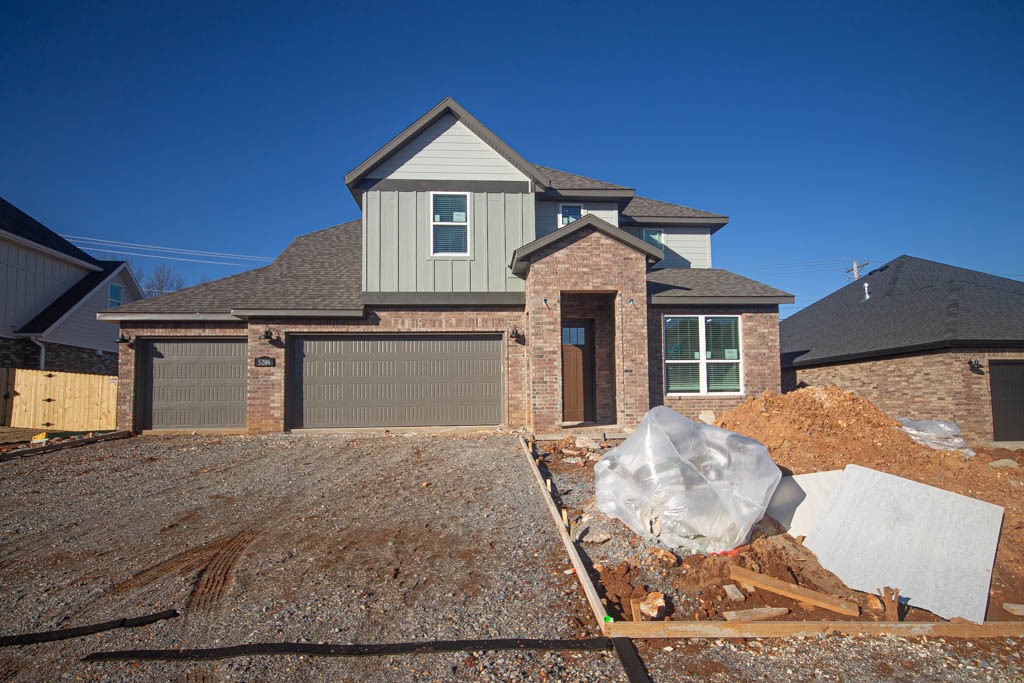 $3,000 if you use the preferred Lenders & fence, blinds and gutters included! MODEL HOMES located at 3801 & 3803 SW Pecan Cir. Discover your dream home in the sought-after Snyder Meadows neighborhood, an up-and-coming neighborhood in West Bentonville, offering a modern open floorplan. Brody plan! Soaring ceilings adorned with custom beams, cozy gas fireplace enveloped in shiplap and stained beam mantle and LVP flooring throughout the main living areas. Chef's kitchen boasting frigidaire stainless steel appliances, gas range, pantry, quartz countertops, and large island, all complemented by gorgeous backsplash. Luxurious master bedroom features abundant natural light, while the spa-like master bathroom offers a walk-in shower, double sinks, and two spacious walk-in closets. Additional features include a main-level study & secondary bedrooms upstairs, all nestled on a generous lot with covered patio that overlooks the serene backyard, creating a truly exceptional living experience in the heart of Northwest Arkansas.