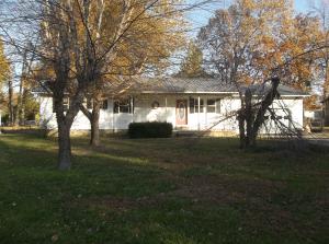 Enjoy a short walk through a quiet neighborhood from this 3 bedroom 2 bath home on large near level lot w/fenced back yard & 2 car garage. This home could be a great place to raise a family. All #'s are approx., age is an estimate, sq. footage per assessor's card. Property to be Sold As-Is.
