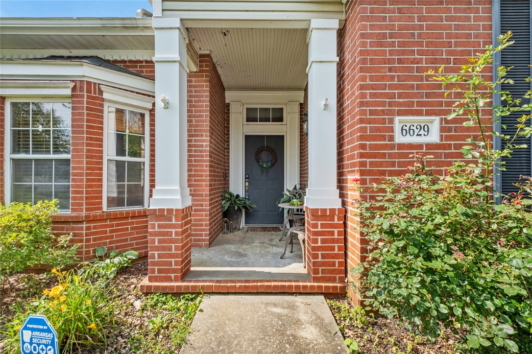 Nestled beneath a canopy of mature oaks in one of Springdale’s most prestigious communities, this 4-bedroom, 2-bath stunner blends classic Southern charm with modern comforts. Walking in you feel the warmth and character that make Har-Ber Meadows a lifestyle, not just a location. Step inside to soaring ceilings, rich hardwood floors, and a sun-drenched living room anchored by a cozy gas fireplace. The chef-inspired kitchen is dressed to impress with a 2nd living space and plenty of room for hosting everything from casual brunches to holiday feasts. Step out back and you’ll find one of this home’s most inviting features: a covered patio complete with a built-in fireplace. String up some café lights, toss a few pillows on the outdoor seating, and you’ve got a private retreat perfect for entertaining or unwinding. As a member of Har-ber Meadows you have access to the clubhouse, swimming pool, trails, and parks. NEW roof in 2025. NEW HVAC & Water heater in 2024. SOLAR PANELS CONVEY! SECURITY SYSTEM CONVEYS!