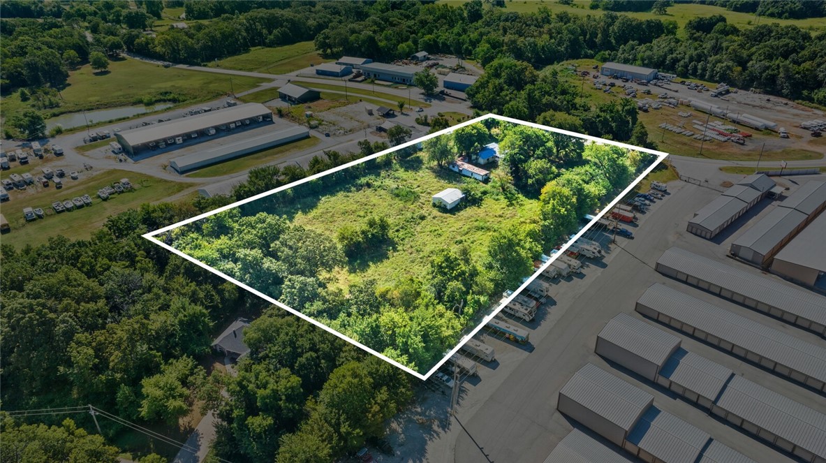 Prime Development opportunity with direct HW 279 frontage. Zoned C-2 in Gravette City limits, this property is positioned between existing commercial and new commercial redevelopment. Adjacent to Bella Vista city limits and under 1.5 miles to HW 49 for easy travel both North and South. Existing home on site with pole barn and old structure. Open, flat and ready for development. Please call List Agent for access.