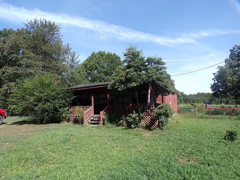 Cozy, quiet, and close to everything — welcome to 319 Carboni Lane!
This 2 bedroom home offers 768 square feet of easy living on a peaceful half-acre lot.
Located just 1.2 miles from Bergman Schools, it’s the perfect spot for anyone looking to downsize, invest, or plant roots. Whether you're after your first home or a smart rental property, this little gem is full of potential.