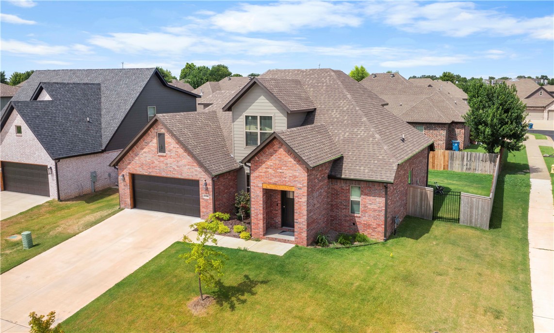 Up to $6000 buyer credit available with preferred lender!!! This property is nested in the sought-after Woodland Crossing neighborhood of Bentonville. Enjoy easy access to Bentonville top rated school (Willowbrook Elementary School). This stunning home offers spacious living with upgraded modern finishes, an open-concept layout, and a beautifully landscaped fenced backyard. It has Patio extension with pergola and a swing. It also, comes with separate installed shed with power hookup. There is lot of storage that was an upgrade to the house like attic build out, and garage overhead storage. All the light fixtures are upgraded. Don't miss this opportunity!