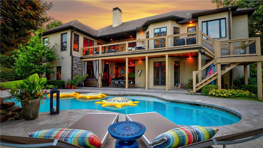 Spectacular home that has been updated with latest finishes. Great floor plan that is perfect for everyday living or entertaining.  Main level features spacious FLR, FDR & an open kitchen, den & casual dining area.  Kitchen has been updated w/quartz countertops, backsplash & 3 new drawer dishwashers. Office w/waterfall built-in desk.  Owner’s suite has a sitting area & bath features updated fixtures.  Guest room w/ensuite; laundry & half-bath upstairs. Lower level has a bonus room w/pool table & 2nd kitchen, movie room w/proj/built-in screen & speakers, wine room, two bedrooms & 2 baths, 2nd laundry room.  In-ground gunite pool, hot tub & 3-car garage. Amazing views from upper deck.  Fabulous & ready for new owners.