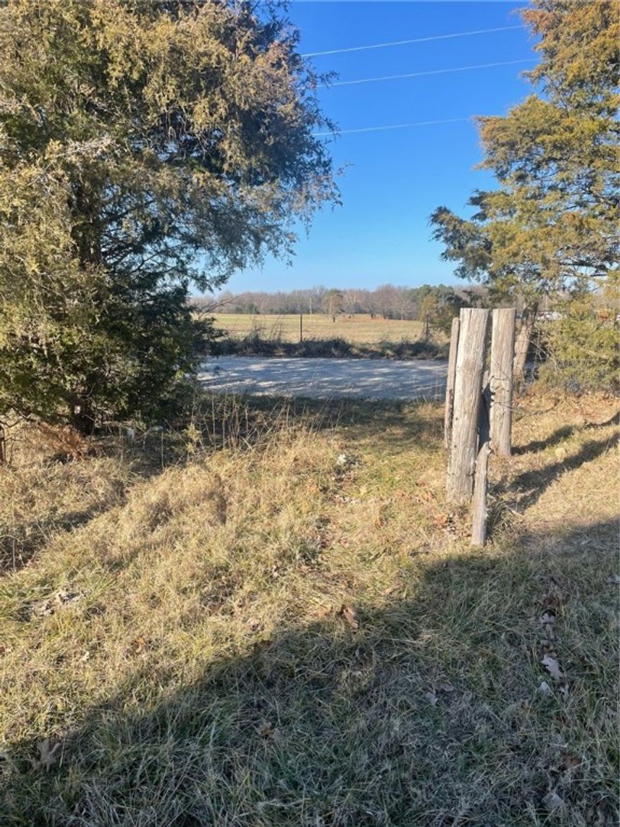 Great opportunity to buy a small acreage to build your dream Home. Pasture, Trees, Pond and an old barn. Rural water is located on property. Just needs a meter put in for rural water. Not to far from town and it feels like you are in the Country.