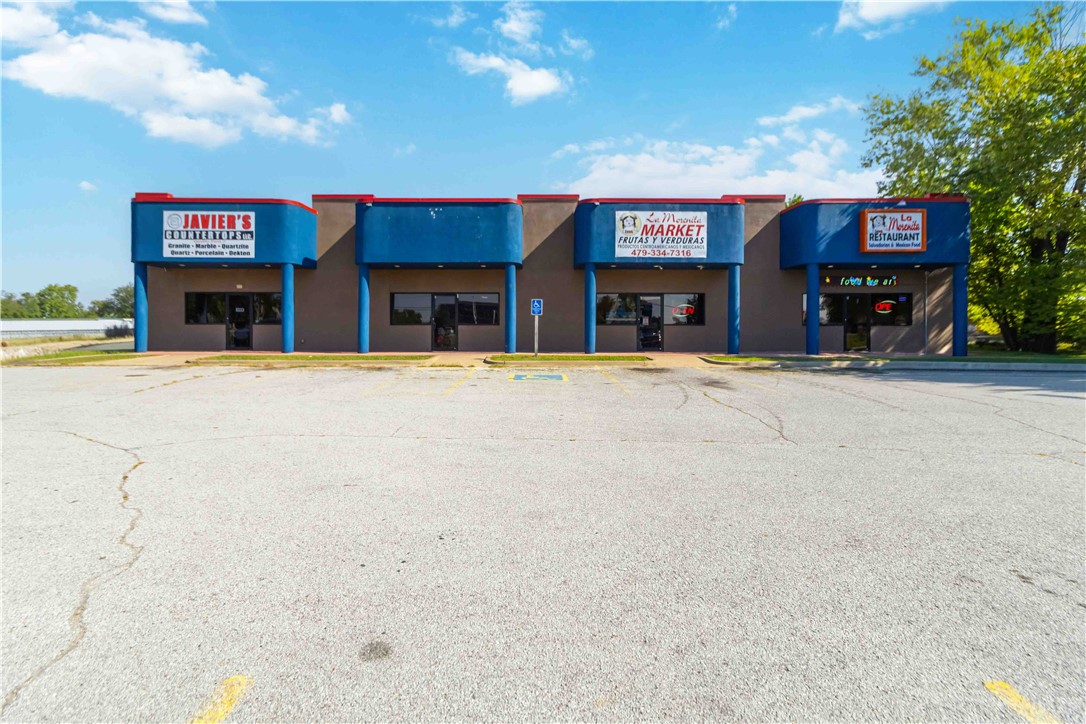 Prime retail investment opportunity in Springdale! Located on E Robinson Avenue (HWY 412), this property offers excellent visibility along a high-traffic main road and features four individual retail units, each renting for an average of $1,800/month (9.65% cap rate). Ample on-site customer parking is available, and the property benefits from a strong 26,000 daily traffic count for maximum exposure. The flexible layout is ideal for a variety of businesses (currently a granite showroom, grocery store, and restaurant), and its strategic location places it close to thriving local shops, restaurants, and residential neighborhoods. Springdale is one of the four major cities in Northwest Arkansas (600,000+ metro population). The cities rapid growth makes commercial real estate a prime investment.