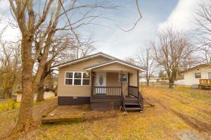 WOW!!! What an update!! This simply adorable 3 bedroom, 1 bath home has been transformed into the best looking house on the market under 100K! New siding, metal roof, CH&A, windows, laminate flooring, wonderful epoxy counter tops, appliances, bathroom fixtures, freshly paint throughout, and the list goes on! Move in ready!! This won't last long!