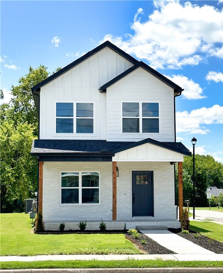 Modern Downtown Rogers home provides comfort, easy maintenance and luxury lifestyle! Home features 3 bedrooms and 2.5 Baths. Quartz countertops throughout, stainless appliances, great storage and designer finishes. All bedrooms are located upstairs, leaving the first floor for entertainment and an open feel. A 6 block walk or bike ride to all that Downtown Rogers has to offer. Coffee shops, restaurants/bars, &  the renowned family park, The Railyard. A short ride to Lake Atalanta opens up paved and mountain bike trails. Don't miss the Railyard Live at the Butterfield Stage which hosts free concerts every Friday and Saturday night from May to October. This is in addition to easy commutability, access to Farmer's Market and the Rogers Activity Center across the street with Razorback Greenway connectivity,  this home gives you the best of everything.