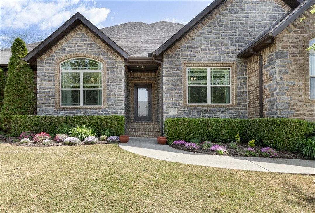 Stunning all brick 4 bedroom, 3 bath, one owner home in East Fayetteville is ready & waiting for its new family. This home has literally everything! Split floor plan with the primary bedroom with large walk in closet, double granite vanity, full tiled walk in shower, jetted tub plus there are 3 secondary bedrooms downstairs. Kitchen has a gas range, double oven, oversized walk in pantry. Upstairs you will find a bonus room that could be used as a 5th bedroom, full bathroom, large walk in closet with additional flex room/office connected. Backyard features a sizable covered patio that is great for entertaining & relaxation, irrigated raised flower beds & iron fencing. There is a 3 car garage with ample lighting, extra storage space and EV charger. Professionally landscaped & full irrigation system. Sits at the end of a cul-de-sac & has a extra long driveway. Engineered hardwood flooring, 2 programmable thermostats & wired for security. Newer roof, HVAC and hot water heater. Vandergriff & McNair schools.