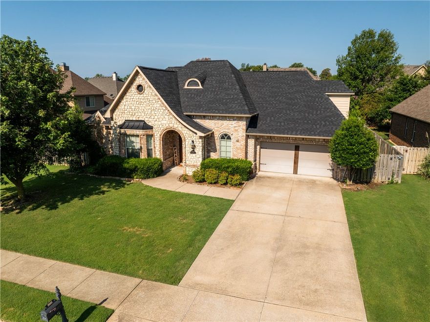 This beautiful French style home is ready for you. The expansive entry opens up into a pleasant formal
dining area and peninsula kitchen that opens into the large living room. The home is primarily tile and
wood flooring with only carpet on the steps up to the bonus room. Sweeping 10' ceilings trimmed in
stacked crown molding and cased doors are a step up in craftsmanship. Not pictured is the butlers pantry and laundry room between the kitchen and formal dining area. The garage is a tandem bay garage. It has a singular double door but also double deep, full length of the house, in one of the bays. The covered back porch is very deep, there is plenty of room for an outdoor kitchen or lounge area. The is access to the patio from the living room and from the garage. New Roof and Water Heater in 2025