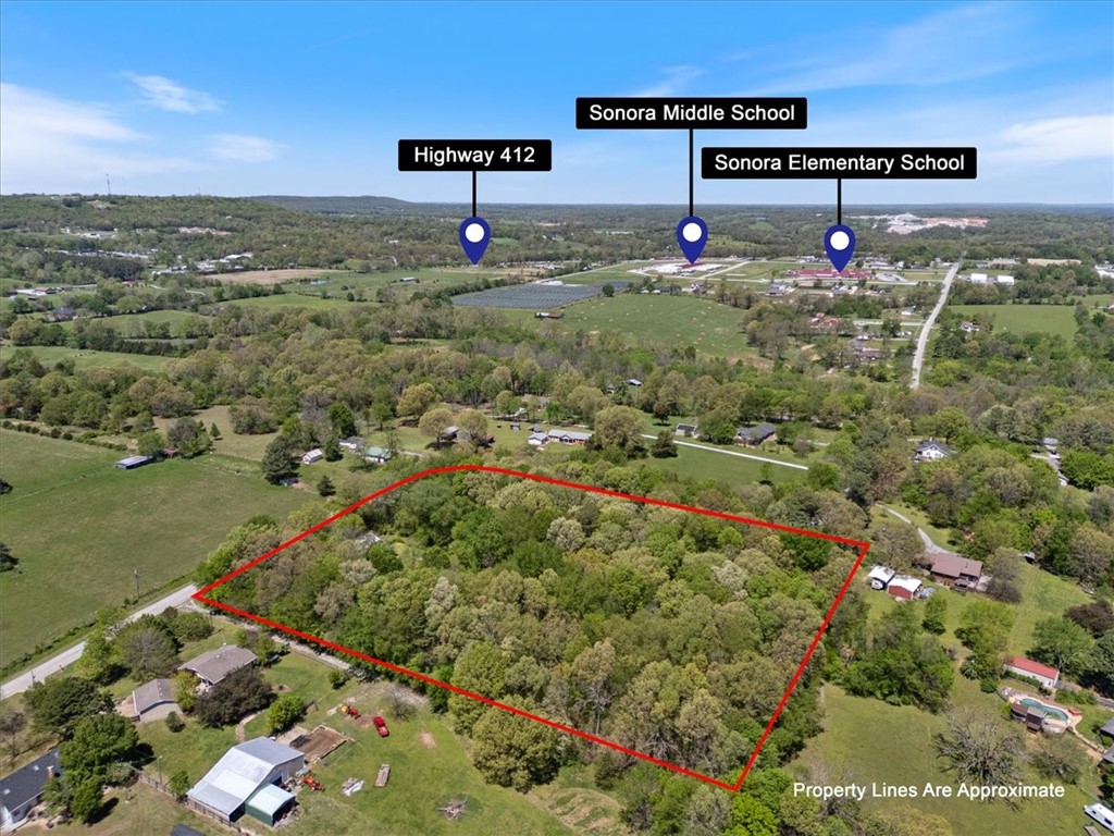 Just off Highway 412 and close to Sonora Elementary and Sonora Middle School. Just over five acres with beautiful mature trees. Opportunity for development or build your dream home here! Minutes to shopping and restaurants! No value in small home located on land.