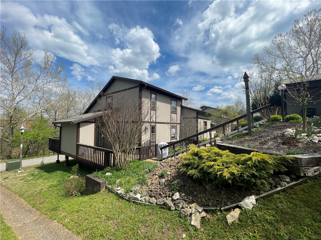 Imagining a great life? Maybe even retirement? Just minutes to be on the water fishing or just relaxing trolling around the lake! Move to the Ozarks to Beautiful Holiday Island! Youāll find a slower pace and most folks are friendly! Doesn't Get Any Better than This!!! Newly updated with a winter view of Table Rock Lake! 2 Bedroom condo with a bedroom, and full bath on each level. Recently installed metal roof! Granite counter tops, newer flooring, baths, and appliances. Brand new chair lift on stairs. Vaulted ceilings, and large walk in closet. Come and see all that holiday island has to offer!