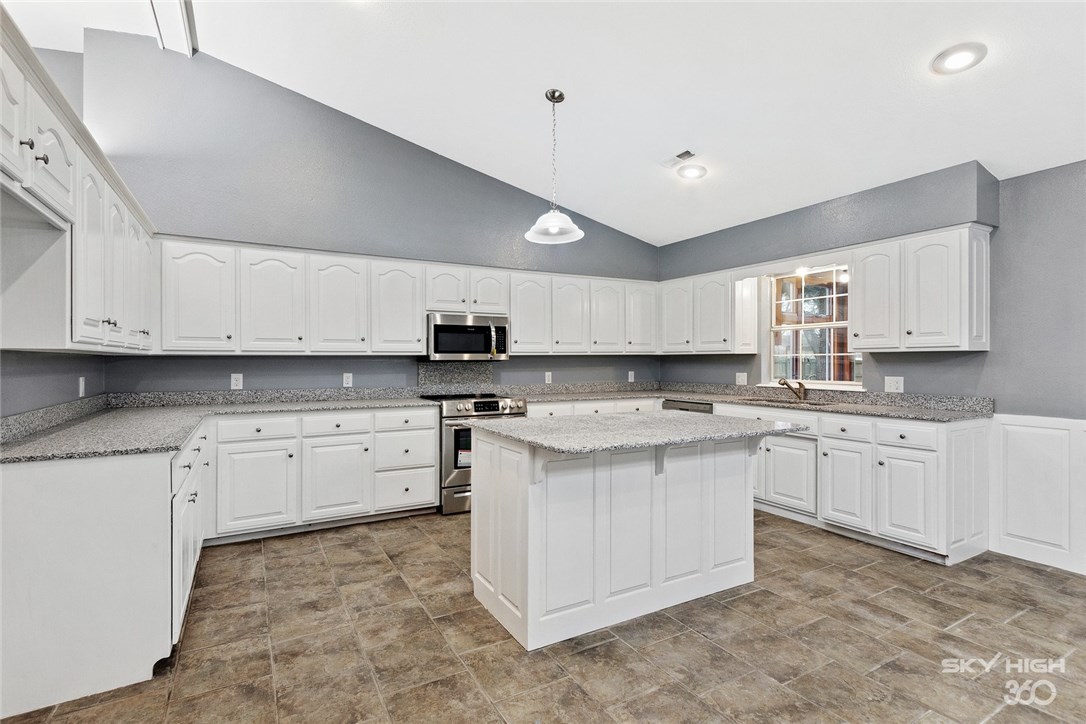Location Location Location! This home is located in the heart of Lowell. The bathrooms and kitchen have been completely remodeled. New flooring and paint though out the home. The home offers a mother-in-law suite with its own balcony as well as full bathroom and a huge walk in closet. This home is perfect for entertaining or a large family. It is located on an oversize lot with tall pine trees in the back yard.
