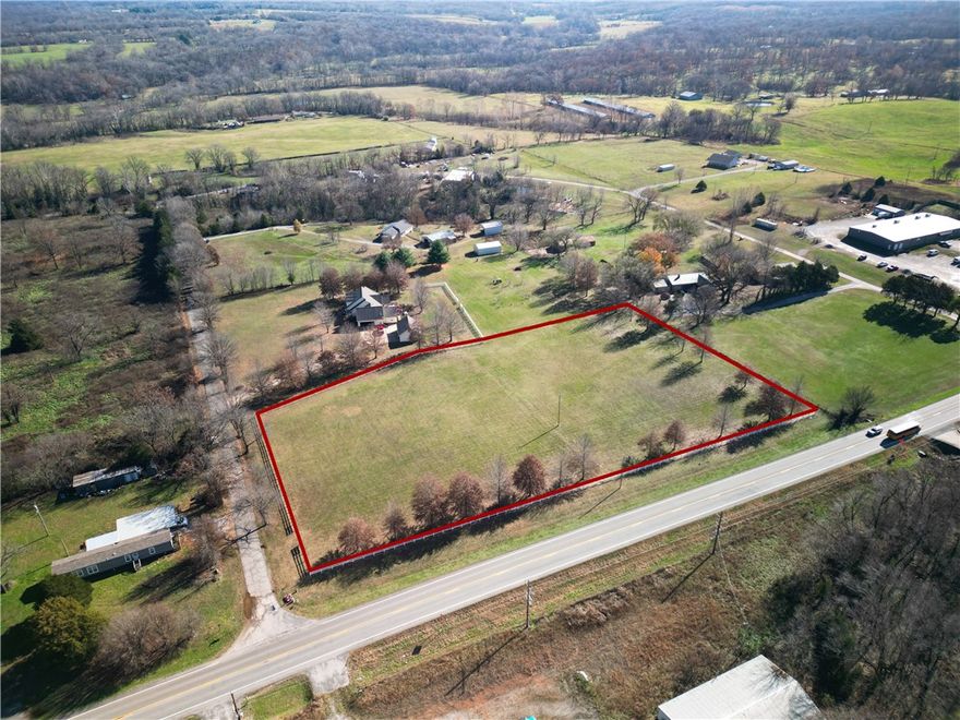 Prime 3.5 Acres on Highway 59 - High Visibility, White Vinyl Fencing, Endless Potential!  
Discover an exceptional opportunity with this 3.5-acre parcel of beautiful, level land located right on Highway 59, offering unbeatable visibility and accessibility. With an estimated 11,000 cars passing daily, this property is ideal for anyone seeking a high-exposure location for future development, commercial use, or a private homestead with room to grow.