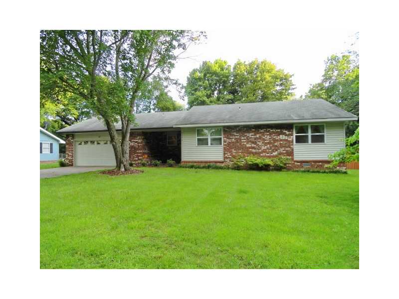 NICE ESTABLISHED NEIGHBORHOOD THAT IS WALKING DISTANCE TO ISD BUILDING. WELL KEPT 3 BEDROOM 2 BATH HOME. MANY UPDATES INCLUDING ALL WINDOWS AND EXTERIOR DOORS, FLOORING, PAINT & FIXTURES. SPACIOUS FENCED BACKYARD WITH MATURE TREES AND TWO STORAGE,BUILDINGS. EXTRA DEEP 2 CAR GARAGE GREAT FOR WORKSHOP AREA.