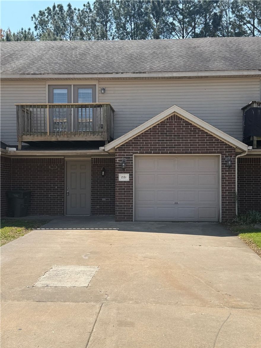 Great townhome in W Fayetteville. Home features vinyl wood floors in living room that opens up to large kitchen with breakfast bar and dinning area, fireplace, back patio for entertaining, 2 master bedrooms with their own baths, new carpet, and walk-in closets and half bath downstairs. 1 car garage and all appliances.