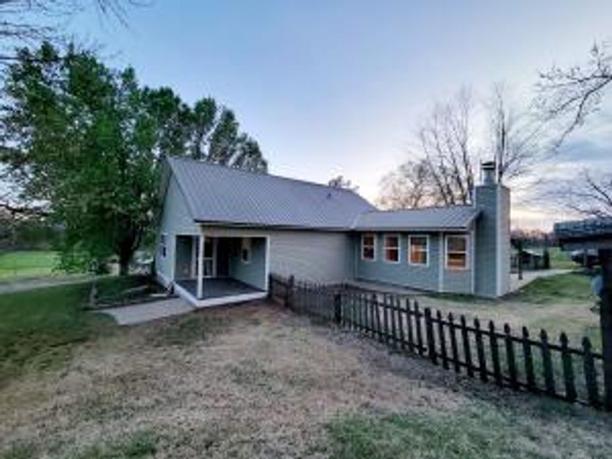 Cozy 2-Bedroom, 1-Bath Home on 4.4 Acres with Breathtaking Mountain Views. Seller offering a $10,000 allowance for heat and air with an acceptable offer. Nestled on 4.4 acres, this charming 2-bedroom, 1-bath home offers the perfect blend of country living with city conveniences. Enjoy stunning mountain views while benefiting from city water and sewer services. Inside, a wood-burning fireplace creates a cozy atmosphere, while the spacious kitchen and dining room provide plenty of room for gatherings. The large bathroom adds extra comfort. Step outside to a picturesque picket-fenced backyard, perfect for children to play safely. A pad is already in place for a shop or an additional home, offering endless possibilities. Don't miss this peaceful retreat with room to grow!