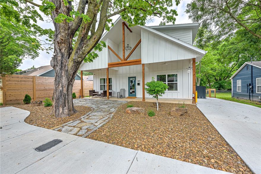 This beautiful 3-bedroom, 2-bathroom house, built in November 2023, is your ticket to the heart of Bentonville's downtown scene. Forget the car – Bentonville's best shops, eats, and arty fun are all within strolling distance. Access to the Razorback Greenway Trail is just down the street! The first floor features a primary suite perfect for waking up refreshed, while upstairs has two spacious bedrooms and a massive closet that could double as your future home office. Imagine whipping up culinary delights in the large open-concept kitchen adorned with granite countertops. Host epic BBQs in the expansive fenced backyard – your furry friends will thank you! With tons of storage space, this house has a place for all your Bentonville treasures. Schedule a showing today and start living the downtown Bentonville dream! Property is currently used as a short-term rental.