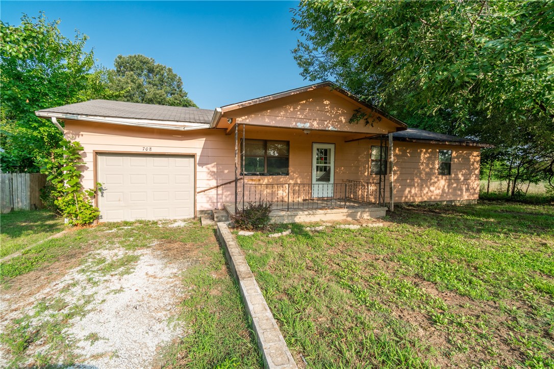 Welcome to your next potential investment or dream home! This charming Green Forest gem is ready for a little TLC to make it shine. Located on a spacious corner lot in the desirable north side of Green Forest, this 1216 sq ft home offers plenty of room to grow and create memories. Inside, you'll find a large living room perfect for relaxation and entertainment. The bright kitchen offers ample counter space and storage, awaiting your personal touch. With three bedrooms and 1.5 baths, there's enough room for family, guests, or a home office. Simple renovations can transform the half bath into a full bath, enhancing the home's appeal. Step outside to your backyard oasis, complete with a workshop/storage building ideal for DIY projects or extra storage. With its prime location and affordable price, this home won't stay on the market long.