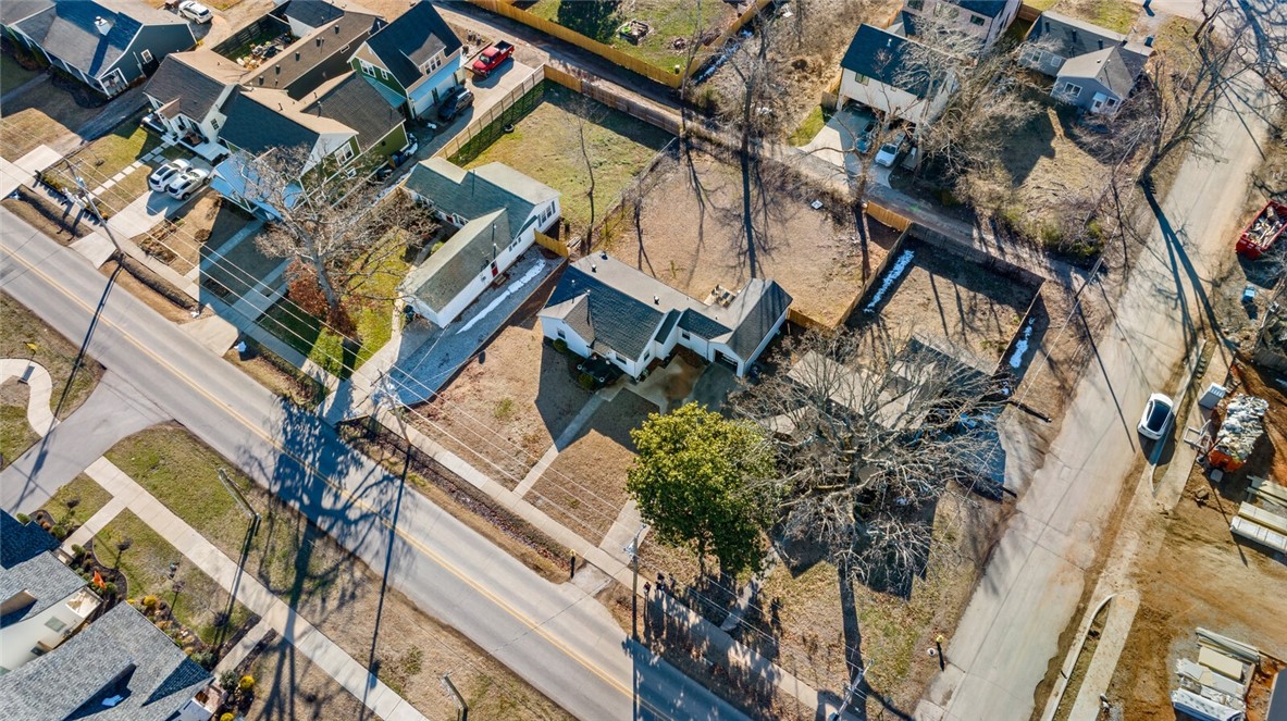 Premium location in downtown Bentonville-just seven blocks from the Bentonville Square and all the amenities downtown has to offer! The property at 817 NW A Street is also available. Together, these two properties present a fantastic opportunity for redevelopment under DN2 or DN3 designations. This property features alleyway access, enhancing its potential for your redevelopment project. With great possibilities in an excellent location, you won't want to miss out!
