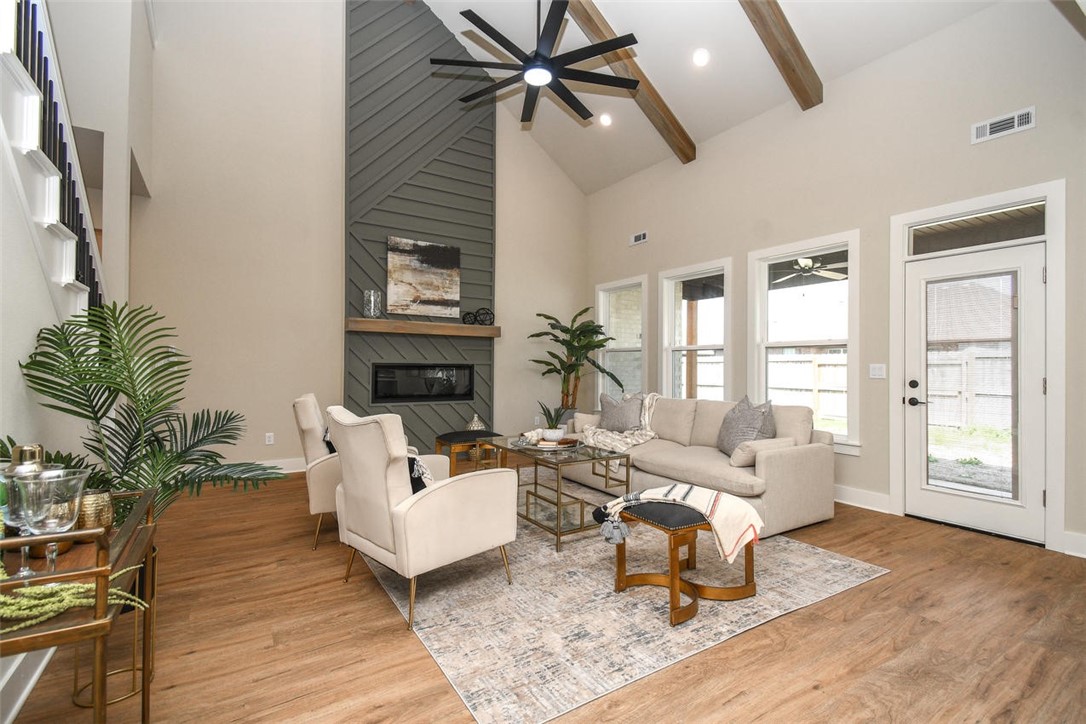This beautifully upgraded home offers outstanding value and space. The open-concept main level features an oversized island, quartz countertops, custom ceiling-height cabinets, a walk-in pantry, and luxury vinyl plank flooring. Two bedrooms, two full baths, and a cozy study complete the first floor, while the upstairs includes two more bedrooms, a full bath, and a spacious theater/game room. Highlights include tiled showers, an electric fireplace with custom trim, an EV charging port, and a gas line for outdoor grilling. Walkable to top schools and minutes from I-49, downtown Bentonville, and Walmart HQ. ***** Up to $10,000 towards closing cost or rate buy down up to 4.8% and up to $5,000 credit from Preferred lender