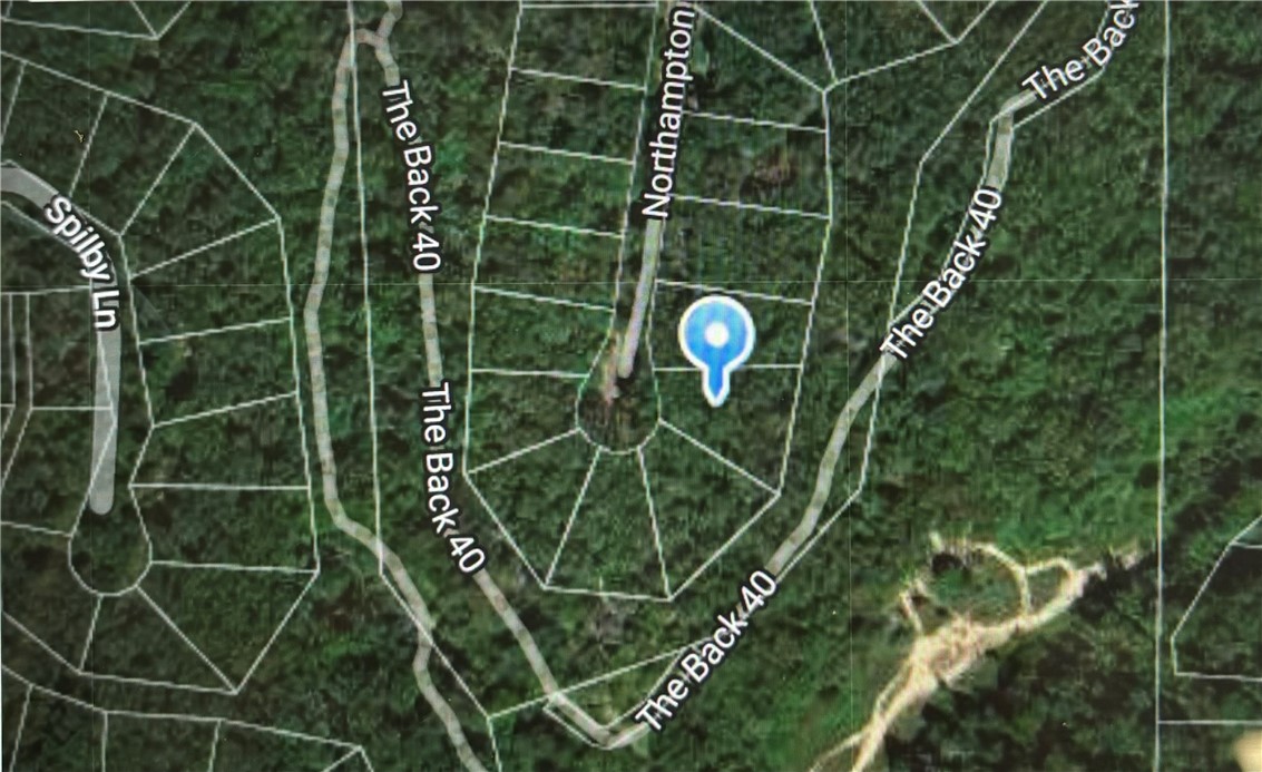 Discover serenity in this secluded .32-acre gem nestled in Bella Vista's Northampton Subdivision, offering privacy and within very close range to the scenic back 40 biking trail. Explore Bella Vista's lakes, golf courses and plethora of amenities including biking trails, rec center, and Country Club. Your perfect retreat awaits!