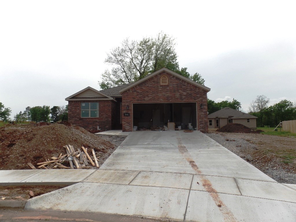 New 4 bedroom home! Open floor plan, living room features crown molding and gas log fireplace. master bedroom has trey ceiling, large walk-in closet. Maintenance free exterior, landscaping and sod in front yard. Estimated completion is 6/17. The pictures of the kitchen cabinets and layout are example only.