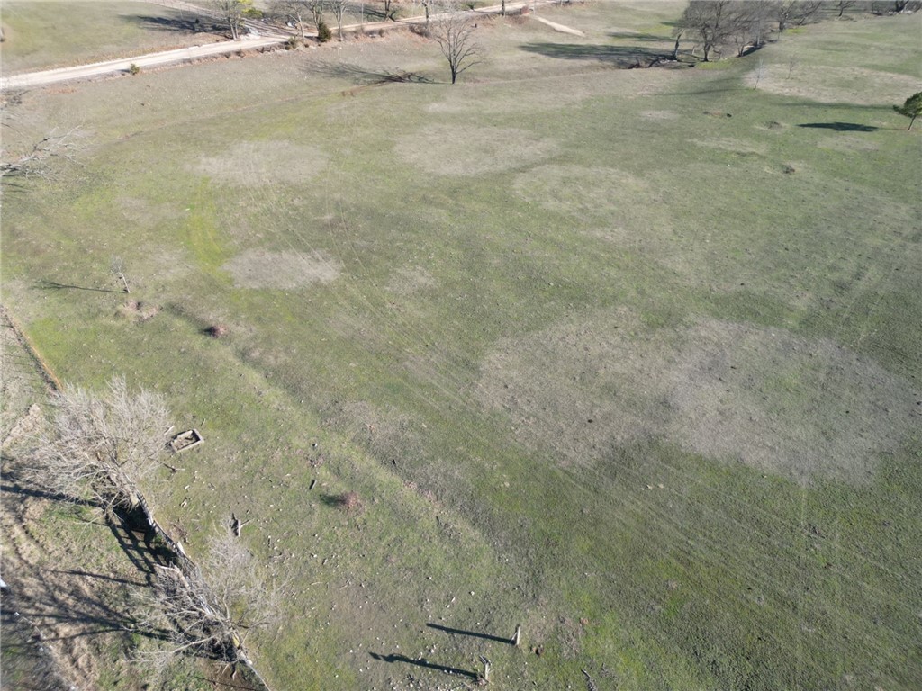 5 acres of incredible build opportunities. Road soon to be paved. Rural water at road. Lots of great options on this one.