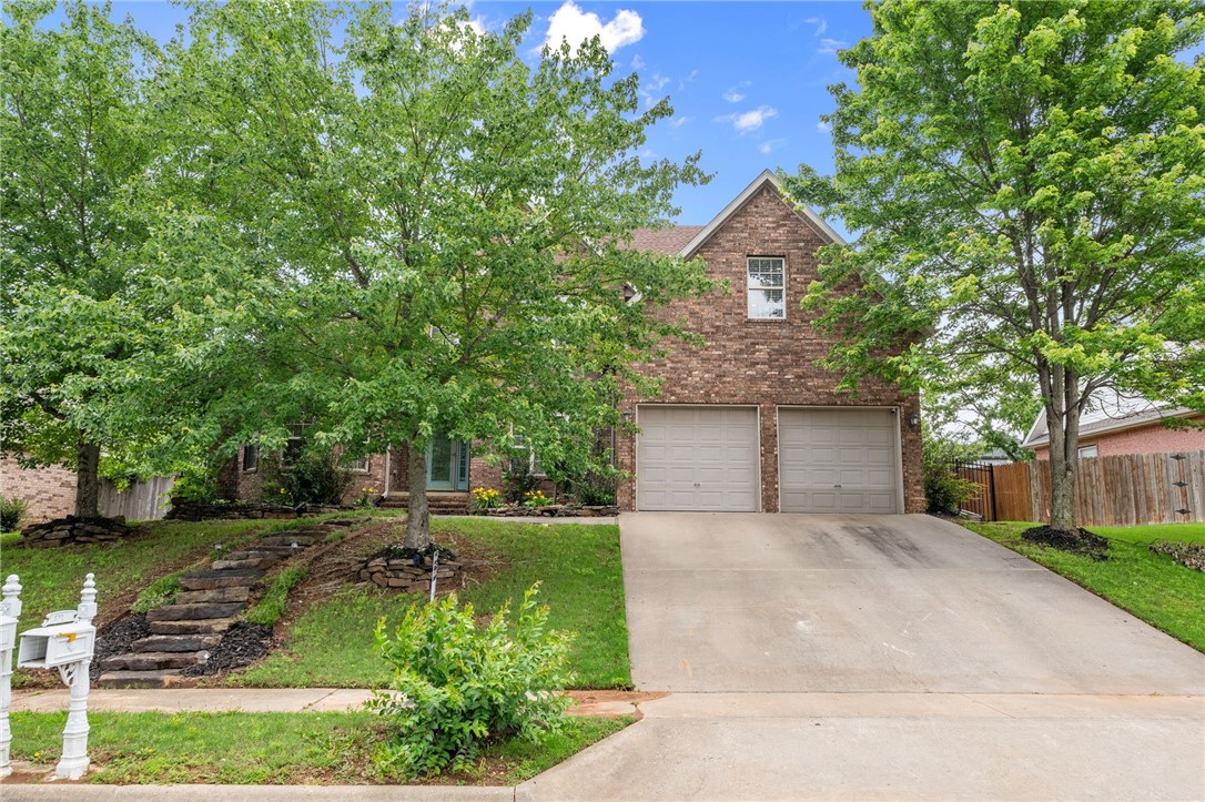 Welcome to 600 Rocky Xing! This 5-bed, 3-bath home sits just outside of town in a quiet neighborhood, giving you the peaceful feel with the perks of being close to everything you need. Inside, you'll love the open layout & tall ceilings. The main floor features two bedrooms, including a huge primary suite with a recently renovated primary bathroom with a spacious shower & three walk-in closets. The kitchen is a dream, with tons of cabinets & plenty of counter space. Upstairs, you’ll find three more bedrooms & a bonus room that’s perfect for a playroom, home office, or movie nights. Out back, there’s an oversized covered patio where you can relax, grill, or just enjoy the outdoors. The washer, dryer, & fridge are negotiable. Recent updates in 2024 include a new dishwasher, stove, microwave, water heater, new paint throughout recently, new kitchen island, new runner on stairs, & extra insulation with pest prevention from terminix. Other upgrades include an epoxy garage & a sunroom.