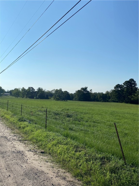 Absolutely beautiful 10 acre tract. Pasture and wooded hillside, to build on for complete privacy. 660' road frontage. Water Meter included with sale. Key to gate in lockbox on gate.