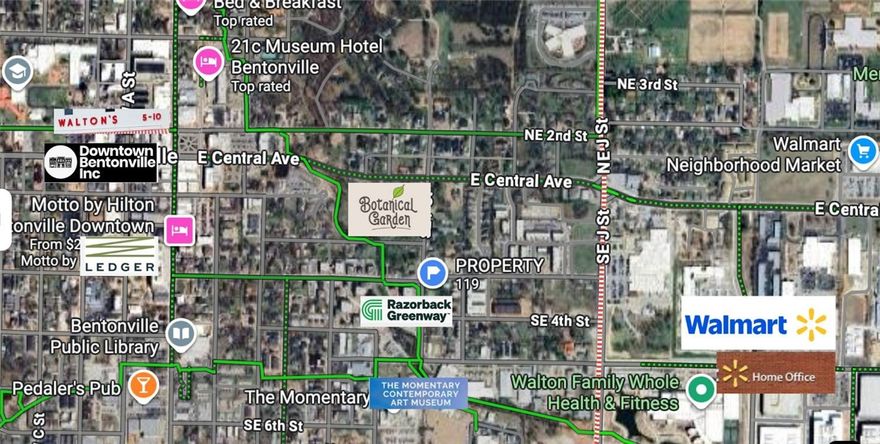 Urban lifestyle meets opportunity with this newly zoned DN-4 (as of 10/28) prime corner lot in the heart of downtown Bentonville. From your front yard, you can see the Momentary and the Razorback Greenway bike path across the street, the Walmart Home Office campus a couple blocks away, and future botanical garden taking shape just down the street. This property captures the essence of downtown living — high visibility, unbeatable walkability, and stunning westward sunset views. Rarely does a location with completed rezoning and such future promise come to market — seize this opportunity to create, expand, or invest in the next chapter of Bentonville’s growth.
