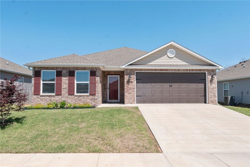 Welcome to this beautifully crafted 2023-built home, ideally located in the heart of Rogers! Just under 10 minutes from Rogers Public Schools, Pinnacle Hills Promenade, dining, & entertainment, this home offers both convenience & comfort. Step inside to discover a bright & open split floor plan featuring a spacious living room. The kitchen features a large island, walk-in pantry, & modern finishes. Enjoy outdoor living year-round with a covered patio.  Whether you're looking for modern style, everyday functionality, or unbeatable location, this home checks all the boxes. Don't miss your chance to own this move-in ready gem in one of Rogers' most desirable areas!