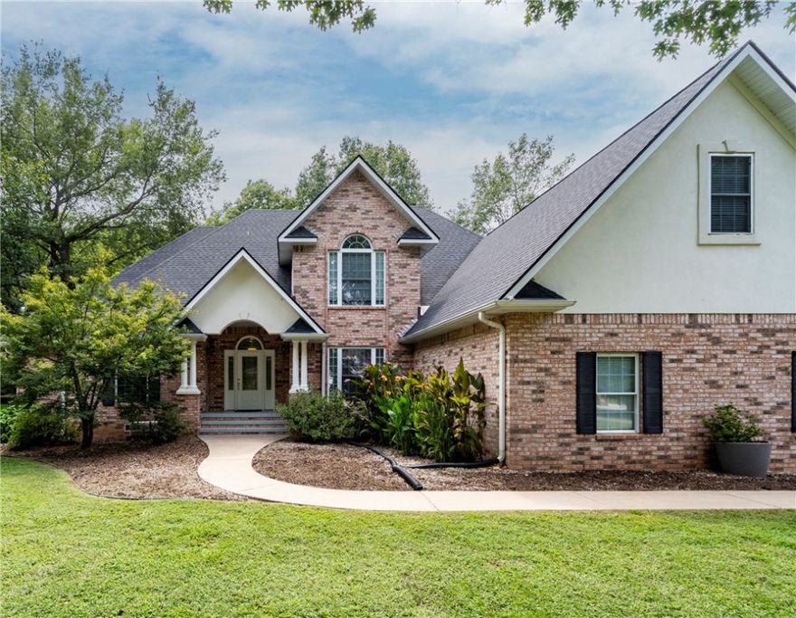 Welcome to this wonderful 1 owner home that is approx. 4,000 sqft, 4 - 5 bedroom, 2.5 bath with a large bonus and craft room. This home is on, if not the most beautiful street in Siloam Springs! It sets on .93 acres with beautiful trees. Home features 2 living areas and a storm shelter in the floor of the master bedroom closet! Built-ins, central vac, office that could be a smaller 5th bedroom, large family dining room for entertaining friends or family and large bedrooms and at price to make it your own. Its less than a mile from JBU! Homes for sale on this street are rare. This is a wonderful opportunity.