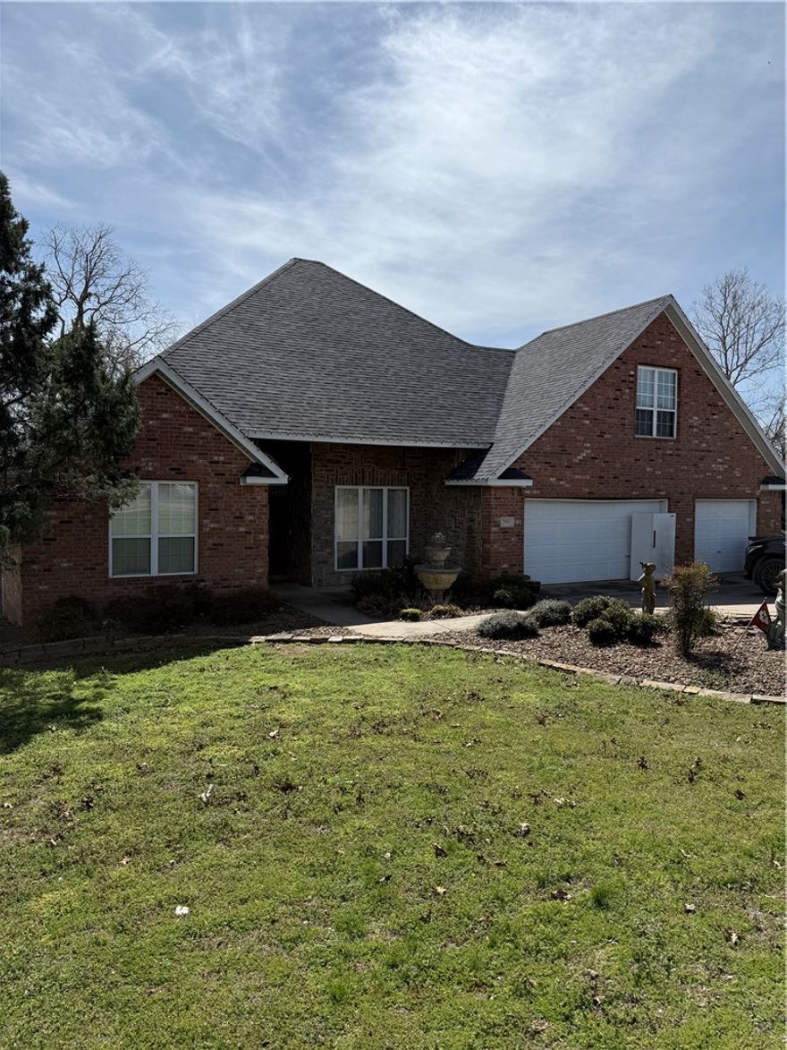 Beautiful landscaped 3,250 sq ft home on 2+ acres in Springdale! Located at 2983 Wagon Wheel Rd, this property offers space, privacy, and versatility. This brick and rock home features 3 bedrooms, 2.5 bathrooms, soaring ceilings, and a grand entry. Large upstairs bonus room ideal for game room, theater, or office. Includes sunroom, cozy den with gas fireplace, an eat-in kitchen with island, granite countertops, and custom woodwork. 3-car garage and driveway have plenty space for parking, including RV parking. Exterior features include a large deck, new wood privacy fence, dog kennels, and a storage building. Additional land offers potential for expansion or possible residential office. Ideal for those seeking room to grow, hobbies, or quiet, peaceful living with convenient access to town. Excellent accessibility to I49 and to bike/walking trails. Close to JB Hunt headquarters and Springdale Public Schools. 
Contact John Reddish, Broker, at 479-957-0909 or reddishauctions@gmail.com.
Happy to work with all Realtors