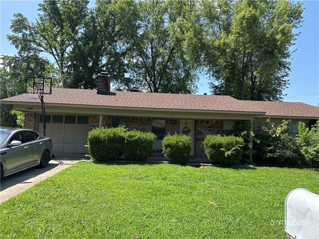 Nice 3 bed 2 bath brick home on a big corner lot. Covered porch and a back patio. Completely fenced in backyard with an outbuilding. There is a brick wood burning fireplace. Property is close to Russellville High school but far enough away you can avoid the school traffic.