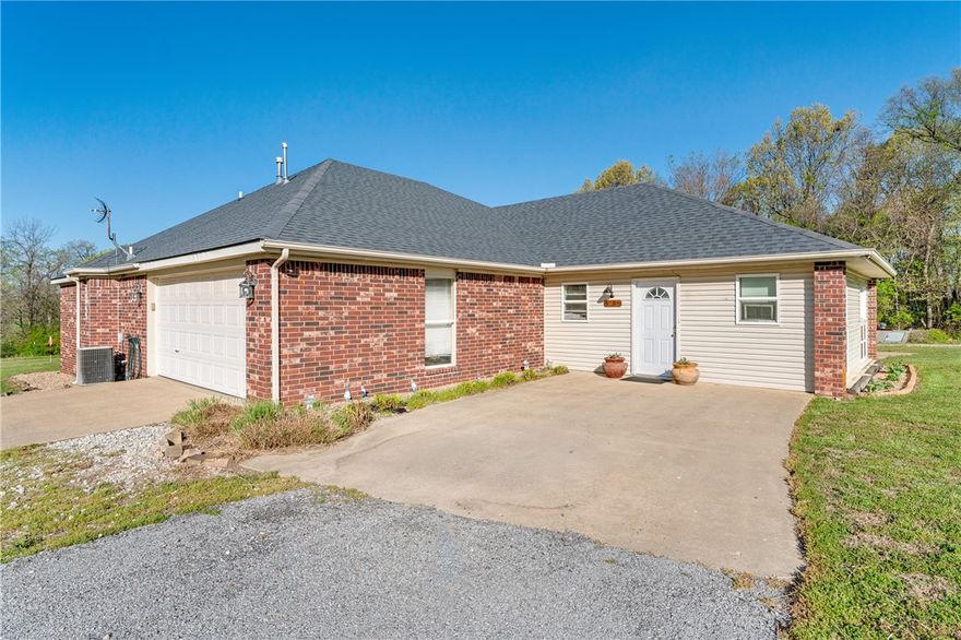 Enjoy space, privacy and functionality on 5.58 acres with this thoughtfully laid-out three-bedroom, 2-bath home. A versatile welcoming living/entertainment area provides the perfect space for movies, playtime or a retreat, flowing seamlessly into the main living room, dining area and kitchen for a functional layout that works well for both everyday life and entertaining. The primary bedroom offers a private sanctuary with its own bathroom, while two additional bedrooms are connected by a Jack-and-Jill bath, providing convenience and flexibility. Step outside to the back deck and enjoy views of the open land directly behind the home, an ideal location for a future pool or expanded outdoor oasis. An insulated shop with electricity enhances the property’s usability and offers endless possibilities. With acreage that invites expansion and a layout built for comfortable daily living, this property presents a rare opportunity to enjoy both space and practicality in a setting that’s becoming increasingly hard to find.