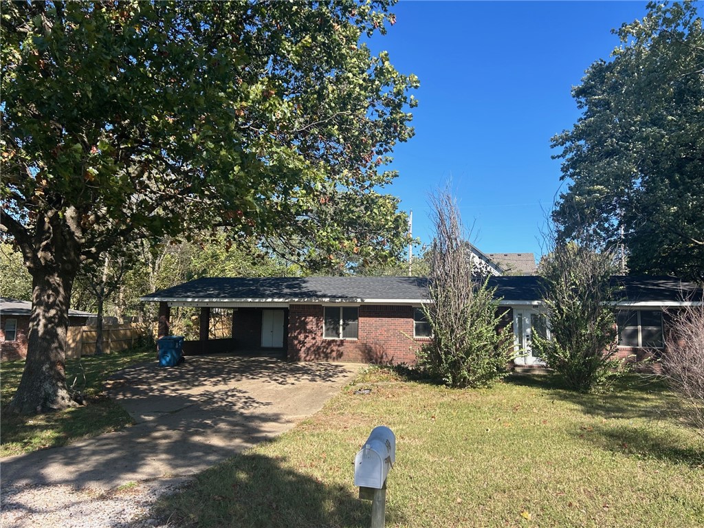 If you are looking for your opportunity to move to Small Town America but be minutes away from all the amenities you could ever want ( in Bentonville) look no further! This beautiful 3 bedroom 1 bath all brick home is close to schools, grocery shopping and parks! This home is ready for you to make your own and is need of some TLC. This home has a nice big living room that makes it perfect for entertaining. The main bedroom is exceptionally large and since this home is a split floor plan it stays more quiet. The large back yard would be perfect for you to add a pergola, a fire pit, or even a garden! The large laundry room / mud room helps keep the mess out of the rest of the house. Newer roof! Newer hot water heater! With a little elbow grease this house would shine!