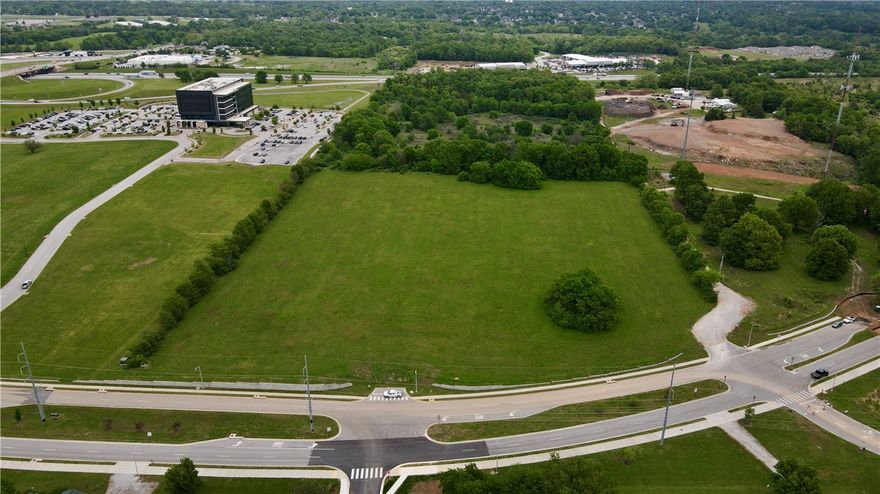 Highly desirable commercial lot containing 11 acres located off of 56th Street. Zoned C-5. All utilities are onsite. Great access to the interstate. Property is great for mixed-use development (office, school, church, medical). Located near Children's hospital, Highlands oncology, Arvest ballpark. Additional acreage is available. Lot is open, level and ready to build!