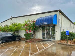 Great multi-purpose commercial building conveniently located close to I-40 as well as the Russellville airport. The building sits on two acres and has a total of over 21,000 sqft. It features 2 overhead doors, 3 phase hookup and 1200 amp service. The property features 2 locker rooms, 1 break room with a kitchen area, a server room, a reception area, 2 conference rooms, 12 office spaces, 3 restrooms, 2 mezzanine areas, 1 maintenance tool room and 1 back storage area as well as a very large heated and cooled warehouse space. This property offers a great opportunity to take your business to the next level! Call for your showing today!
