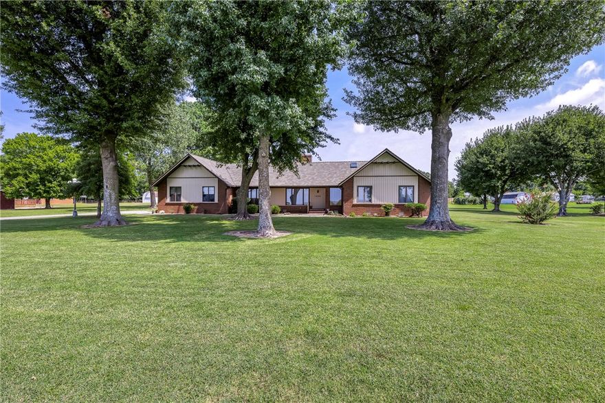 Welcome to your dream retreat on nearly 2 flat acres in a prime location—just minutes from shopping, dining, and schools! This inviting 4-bedroom, 2-bath home offers space and comfort, featuring a large living room perfect for family gatherings or cozy nights in. Step outside and discover a spacious yard, large enough for a pool, pool house, or both—giving you endless opportunities to create your own private oasis. For hobbyists or extra storage, two versatile shop buildings (one is 8x8 and one is 12x14) provide plenty of room for projects, tools, or even a small business venture. With 1.99 acres of level ground, there’s ample space to play, garden, or simply enjoy the wide-open surroundings. This rare property blends convenience, charm, and opportunity—ready to welcome its next owner home!