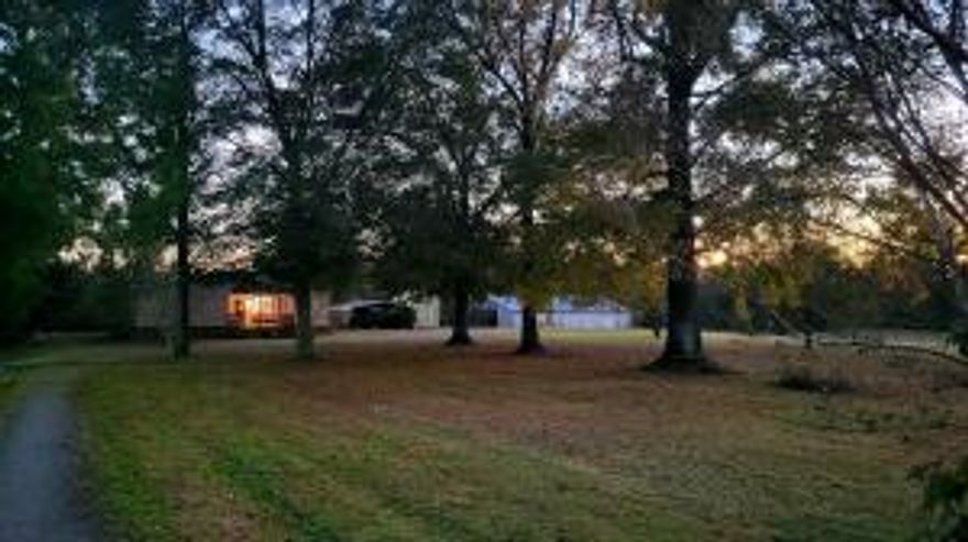 Looking for land??? There is approx. 25 total acres with a 2br 2ba cozy farm home. With about 1/2 of the land wooded & filled with deer and the other 1/2 is fenced and ready for livestock. The home has been partially remodeled. The kitchen, living room and one bathroom have been totally remodeled with a warm farmhouse feel. The back porch is screened in, there is a barn, gravel pad for camper with a 30 amp hookup & a 10 x 12 storage building. There is also a stocked pond. Part of land is in the wetlands. Electric is on levelized billing and runs $221 a month. This includes the camper being plugged in and 3 people living in the house. Prior to that is was $153 a month with 2 people in the house. Water averages $35-$40 a month. Trash w/ Brandon's $70 a quarter. Century Link  $70 a month.