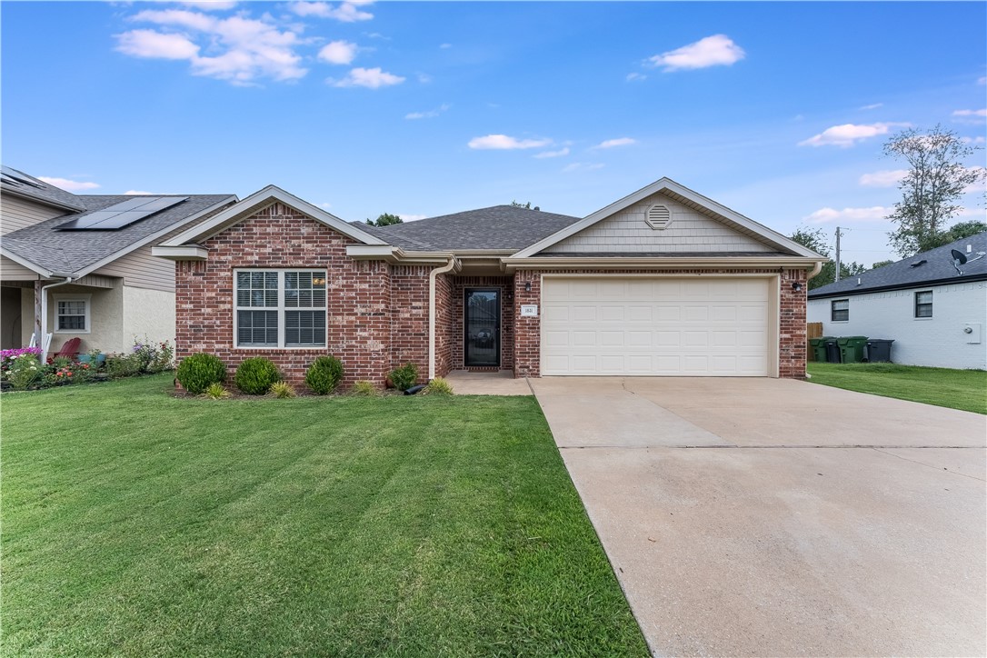 Prime location, meticulously maintained! This 3 bedroom, 2 bathroom home is just minutes away from Lake Atalanta and the shores of Beaver Lake. The primary bedroom boasts lots of natural light. The primary bathroom offers dual sinks and a large closet. The living room showcases a cozy corner fireplace, large windows, and a pass-through window to the kitchen for the ease and convenience of entertaining! The kitchen has a large pantry, ample counter space, and a breakfast nook. The refrigerator, dishwasher, oven, microwave convey with the property. The fully enclosed backyard with a pergola on the deck is perfect for relaxing. Additionally, if you want the flexibility to install an above ground pool, this home is a must-see.