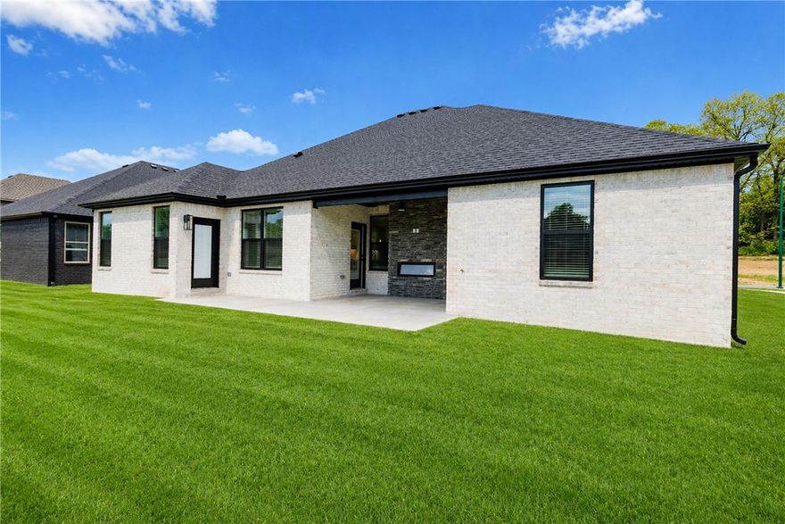 Welcome to this beautiful new construction home in Siloam Springs!! This thoughtfully designed offers modern living space with quality finishes throughout. The exterior features classic brick construction, a 3 car garage, & an inviting curb appeal, while inside you’ll find luxury vinyl plank flooring, an open & functional layout, & abundant natural light. The kitchen is equipped with quartz countertops, energy star appliances, eat-in kitchen space, & ample cabinetry. Enjoy outdoor fireplace and cozy living vibe on the patio. Don’t miss the opportunity to own this move-in-ready new construction home in a growing Siloam Springs neighborhood!