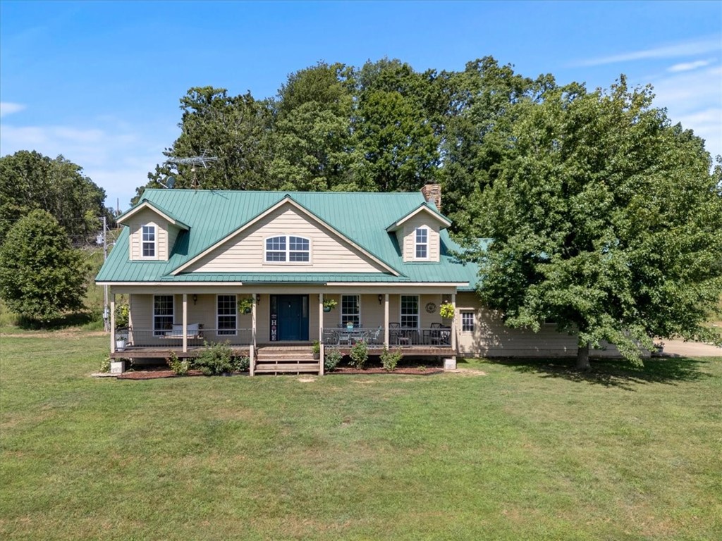 Welcome to your dream home on 40 stunning acres! This spacious 3-bedroom, 2.5-bath home offers the perfect blend of comfort, functionality, and breathtaking natural beauty. Featuring a formal dining room, an eat-in kitchen, and a versatile bonus room—ideal for a home office, gym, or playroom—this home is designed for modern living. The large walk-in closet and generous storage throughout provide plenty of space for all your needs. Enjoy peaceful evenings around the fire pit while taking in incredible panoramic views. With a two-car garage and room to roam, this one-of-a-kind property is a rare find at only $640,960!