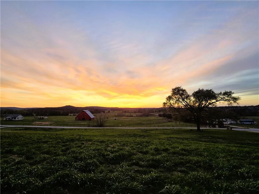 Take advantage of this exceptional opportunity to own 3.38 acres in the desirable Prairie Grove area, offering the ideal balance of country charm and everyday convenience. The property features gently rolling ground, a few mature trees, & gorgeous sunset views. This property has multiple building sites. A temporary driveway is also on site allowing for easy access to come view your new property. There is a fresh pad ready to go, electric & digital cable on site, & water access across the road. Water tap approval is in place. Tap will need to be purchased. Located only a couple miles from shopping, local schools, downtown Prairie Grove, and Highway 62, this property offers the quiet feel of rural living without sacrificing accessibility. With no restrictions, the possibilities are wide open—build your custom home, start a small hobby farm, nursery, whatever your heart desires. Opportunities like this are becoming harder to find in this growing area, making this a great place to build now or invest for the future.