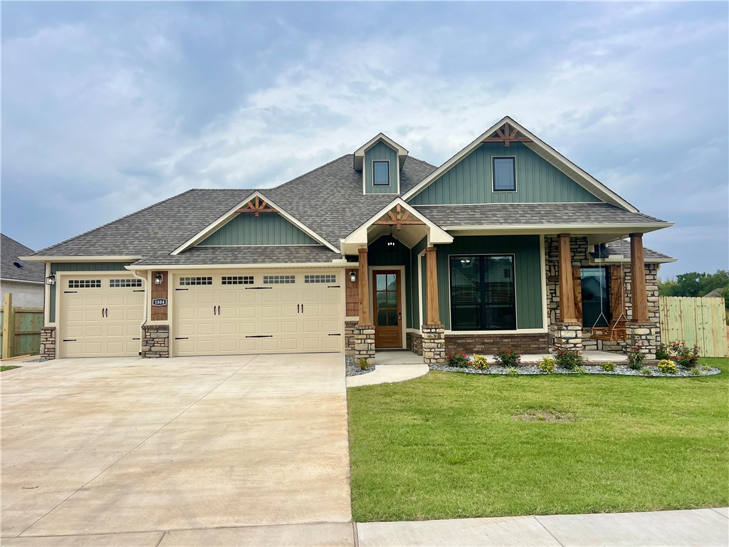 Large porch w/ porch swing, four bdrm, 2 bath, no carpet all hard surface, three car garage, ,pot filler, large covered patio, fence, landscaped, built on cabinets by fireplace