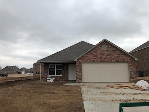 Quality new construction home. Built with full brick exterior and 30 yr architectural shingles for a low maintenance exterior. This home is being built in a Cul-de-sac and in a great neighborhood that is convenient to Siloam Springs City Schools. Home comes with a 2-10 Home Warranty for worry free home ownership. Stop in today and ask about how you could get up to $4000 of you closing costs paid and 100% Financing. Buy in February and receive a free washer/dryer and refrigerator.