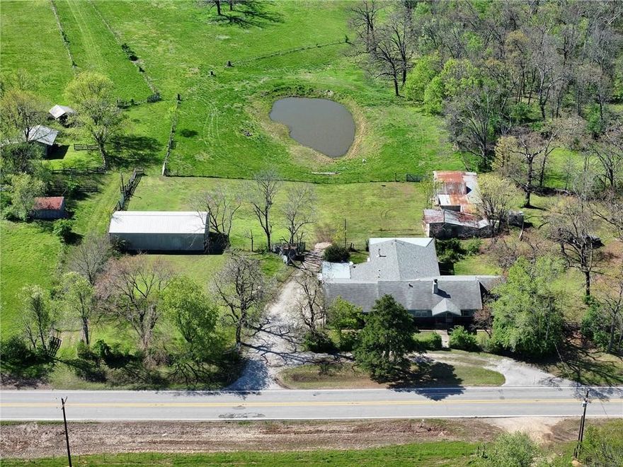 Picturesque 64-Acre m/l farm with lush rolling pastures, multiple ponds & spacious farmhouse! Family owned since 1965, this is a truly special slice of countryside. This farm features gently rolling pastureland, Ideal for livestock, horses, or simply enjoying the open space and quiet of rural living. With five ponds, a collection of  useful outbuildings, and spacious 2,853 sq. ft. farmhouse, this property offers trees and shade lines. The five ponds are perfect for livestock, or adding to the peaceful , scenic setting. Several outbuildings offer storage, workshop space, and shelter for equipment or animals. The older farmhouse offers plenty of room and character, with the potential to update it make it your own.Wether your dreaming of a working farm , a private retreat, or a place to build memories with family and friends, This property has the foundation to bring those dreams come to life. Property also listed as Residential MLS#1303872