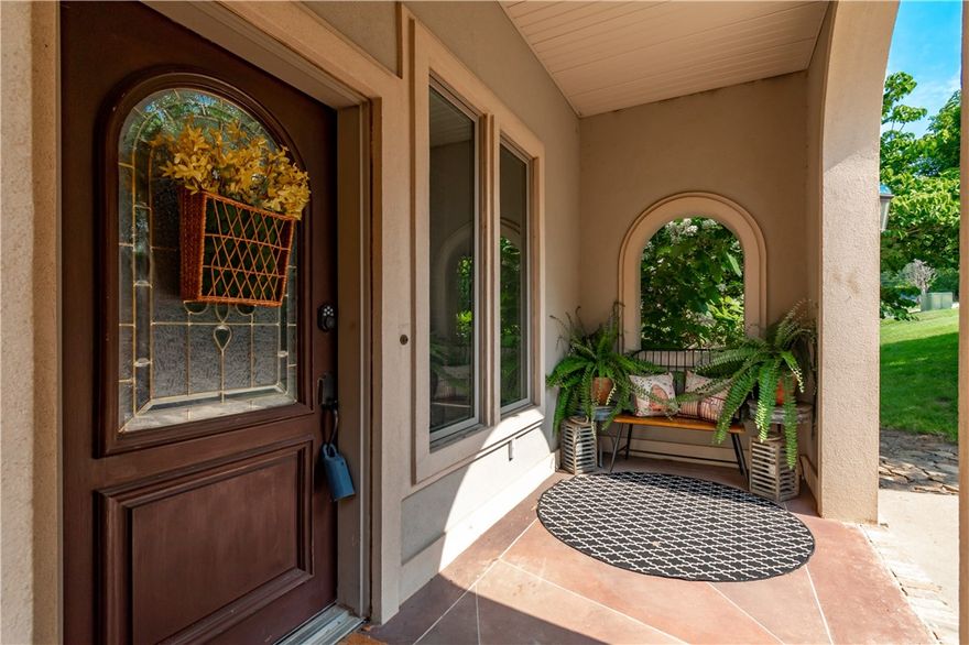 Come home to this bright light-filled custom masterpiece sitting high on the side of Mt. Sequoyah offering sweeping westward views of Old Main and Downtown. With 4 private patios/decks and an outdoor kitchen, your family can enjoy time together or with friends in a spectacular setting -- an entertainer's dream home. Two master suites (one main level and one lower) offer a more seamless multigenerational family layout. The two separate wings on the bottom level were designed with privacy in mind. The main level master boasts a second level master relaxation/exercise retreat with unparalleled views. Brookhaven custom maple cabinets, quartz countertops, heated bathroom floors. This home has storage for days! The most beautiful and top notch custom construction.  It's a once in a lifetime home. Come see this piece of Fayetteville's history and make it yours!